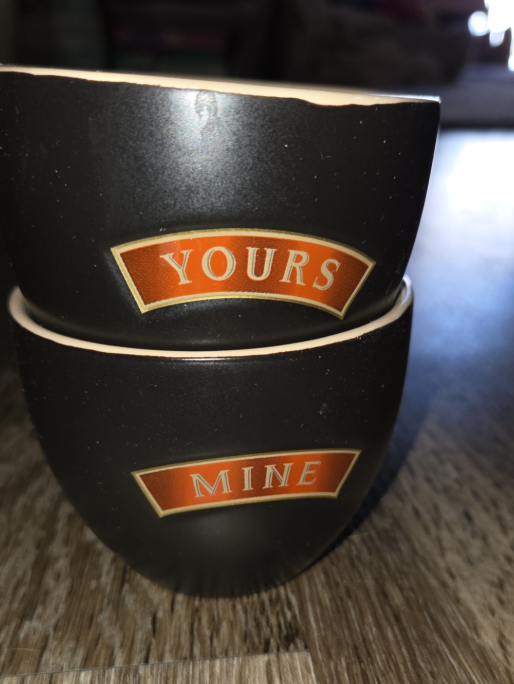 Pair of Black Ceramic Mugs with Orange "Yours" and "Mine" Labels